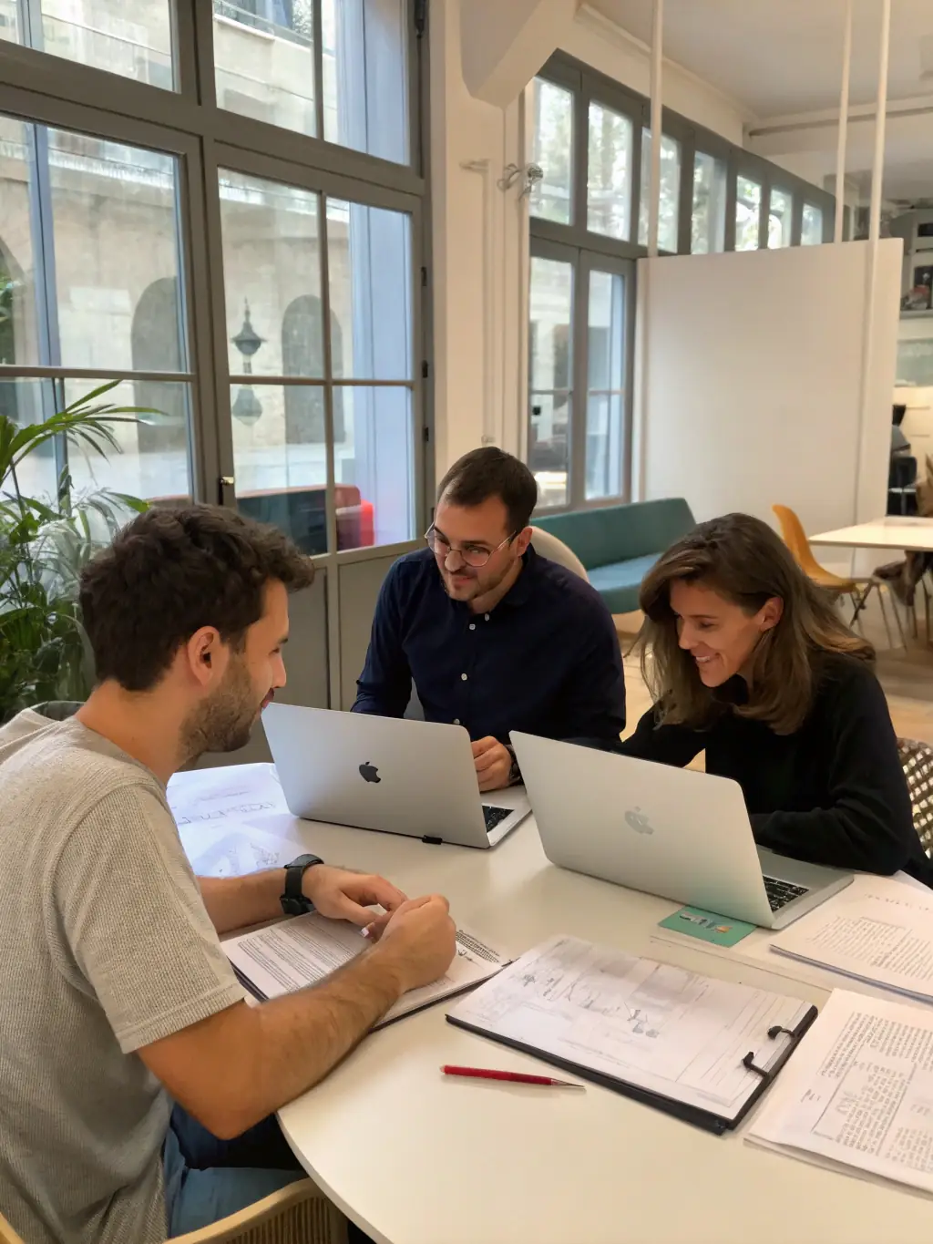 A diverse group of UK-based startup founders brainstorming ideas in a modern co-working space, illustrating collaborative innovation.